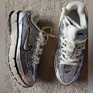 Nike P 6000 Women's Silver Metallic Running Sneakers women’s size 10 men’s 8.5